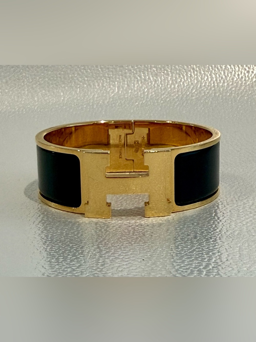 Hermès Enamel Clic H Bracelet in Black with Gold Hardware